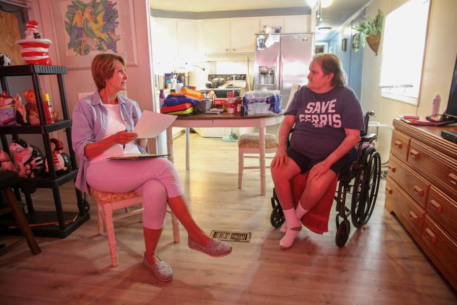 Nina Gray, founder of the Collier Resource Center, with a client
